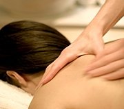 Woman receiving massage. - Copyright – Stock Photo / Register Mark
